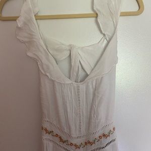 White and floral jump suit